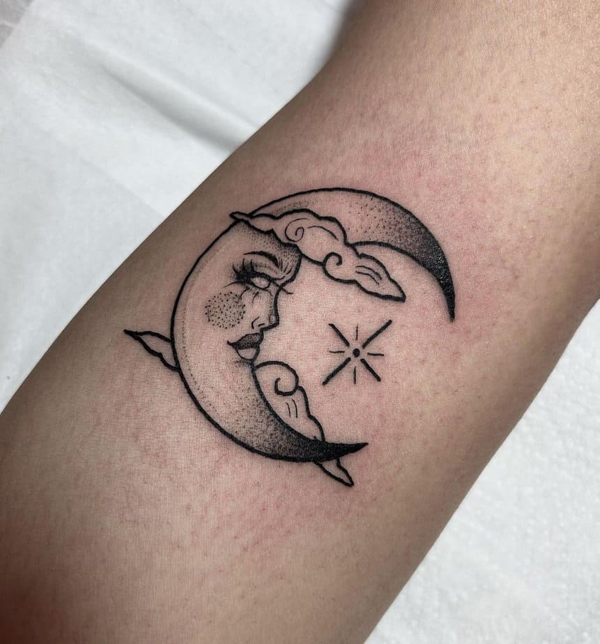 Moon face tattoo