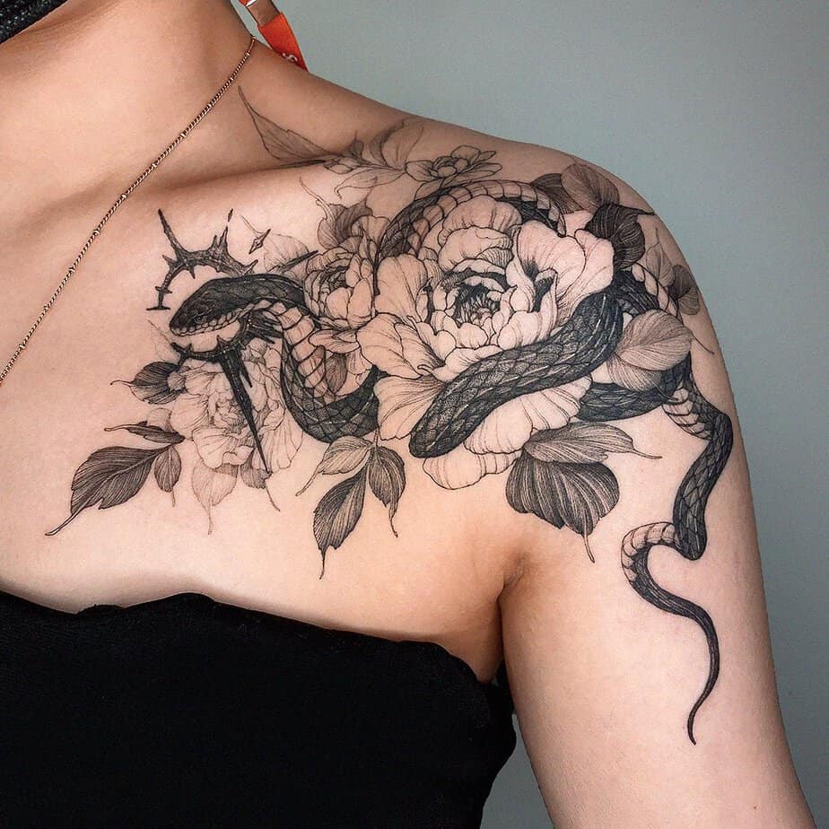 Snake shoulder tattoo