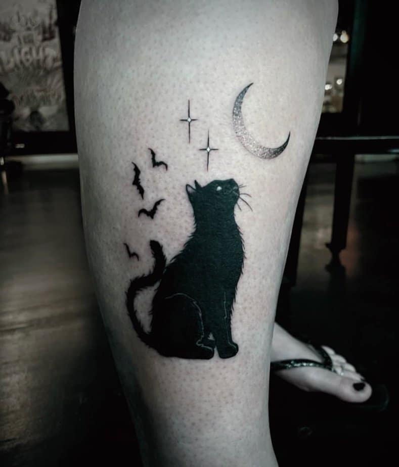 Cat and moon tattoos
