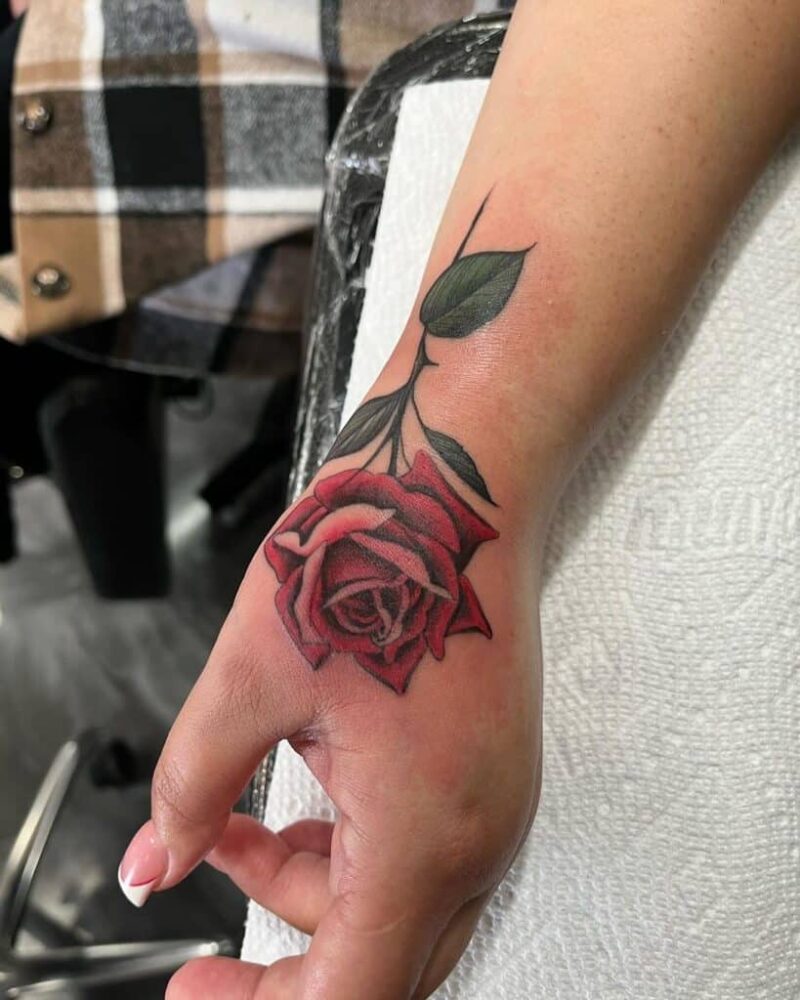 rose tattoo on a hand meaning and 20 design suggestions