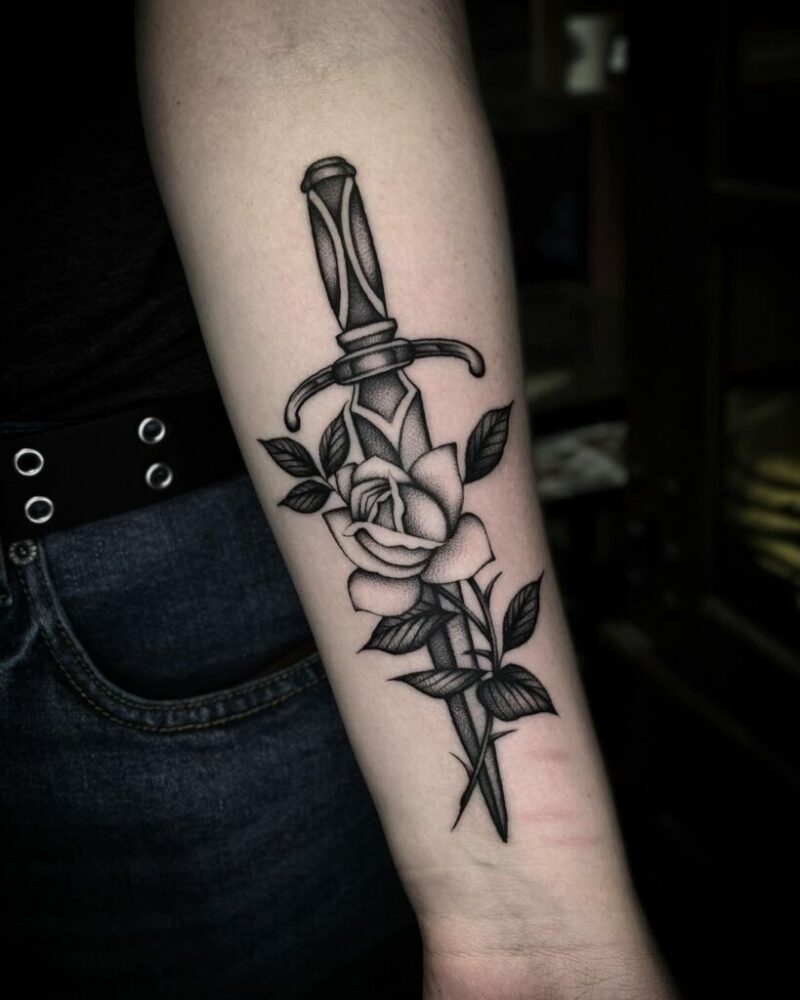 rose with dagger tattoo meaning and 20 thrilling ink designs