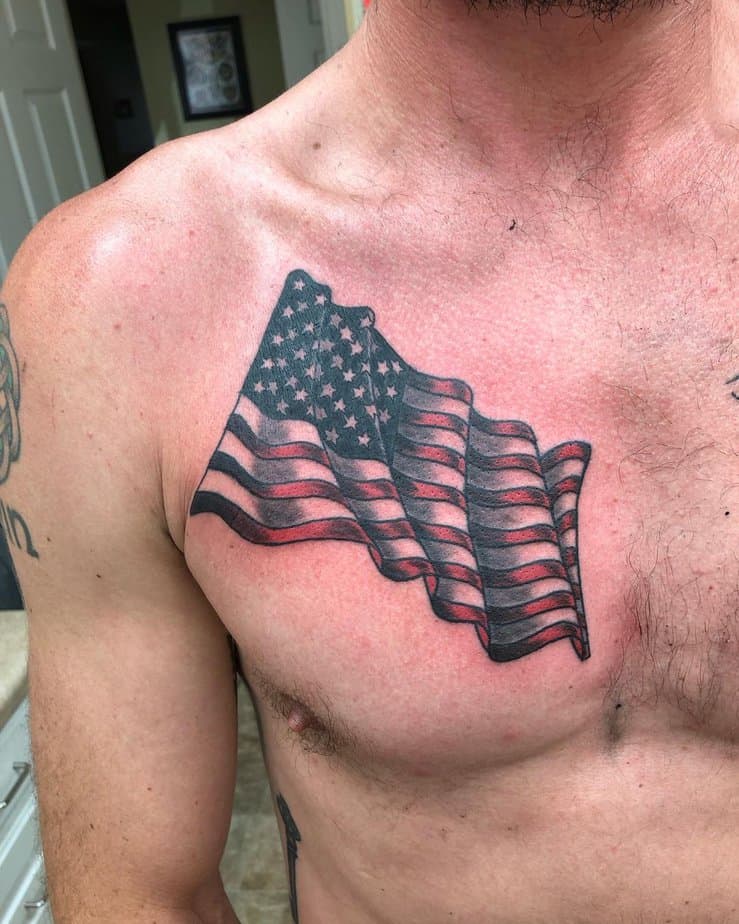10. Bold chest flag tattoo