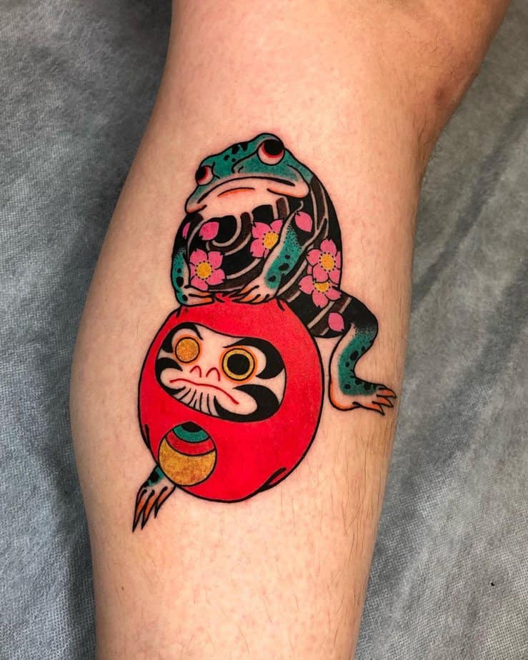 20. Frog and Daruma tattoo