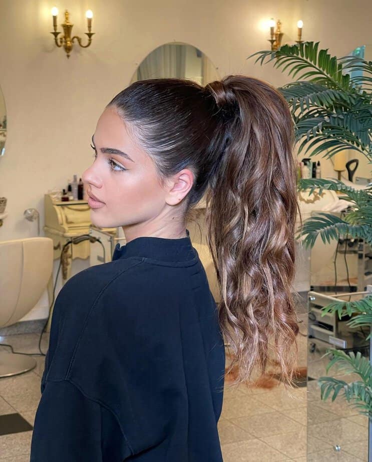 22. High ponytail with waves