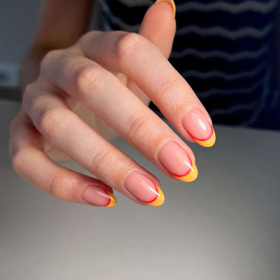 34. Sunset inspired yellow and red tips