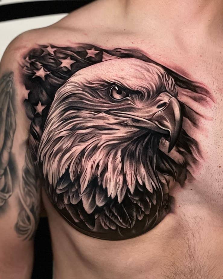 6. Majestic eagle and American flag tattoo