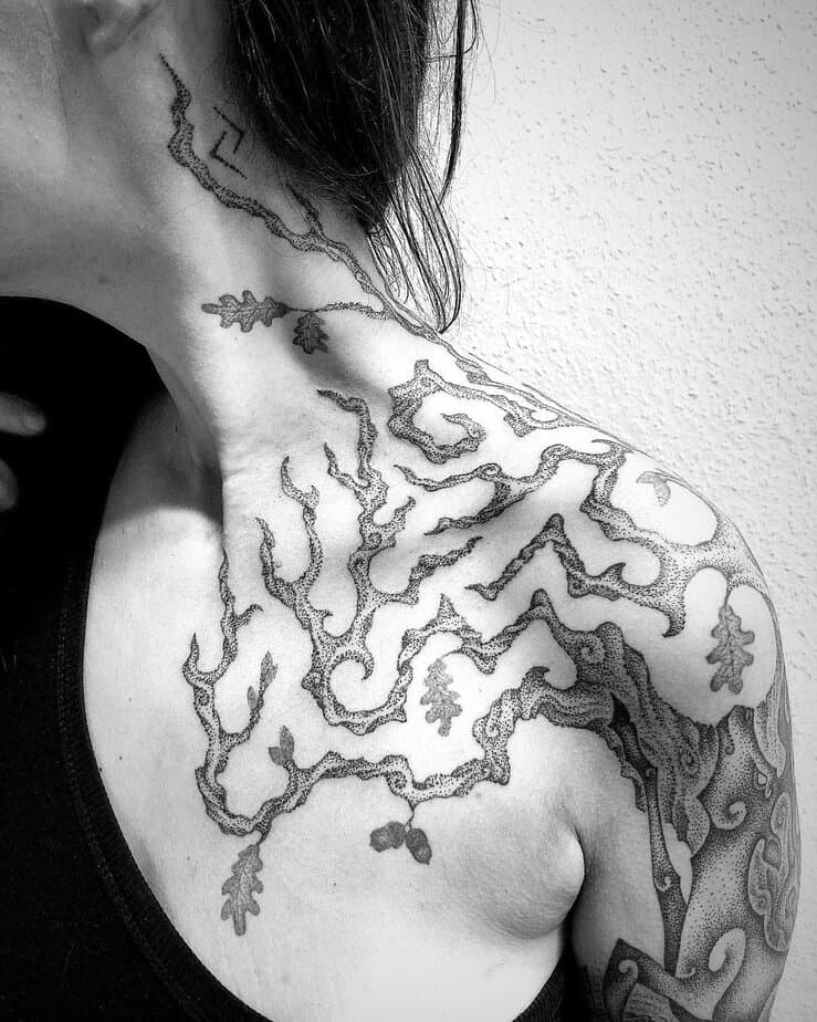 A Yggdrasil tattoo on the shoulder and neck