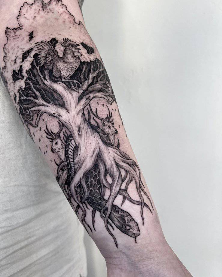 A detailed Yggdrasil tattoo on the inside of the arm