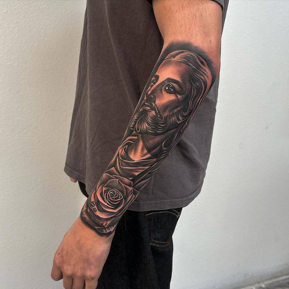 Jesus forearm tattoo
