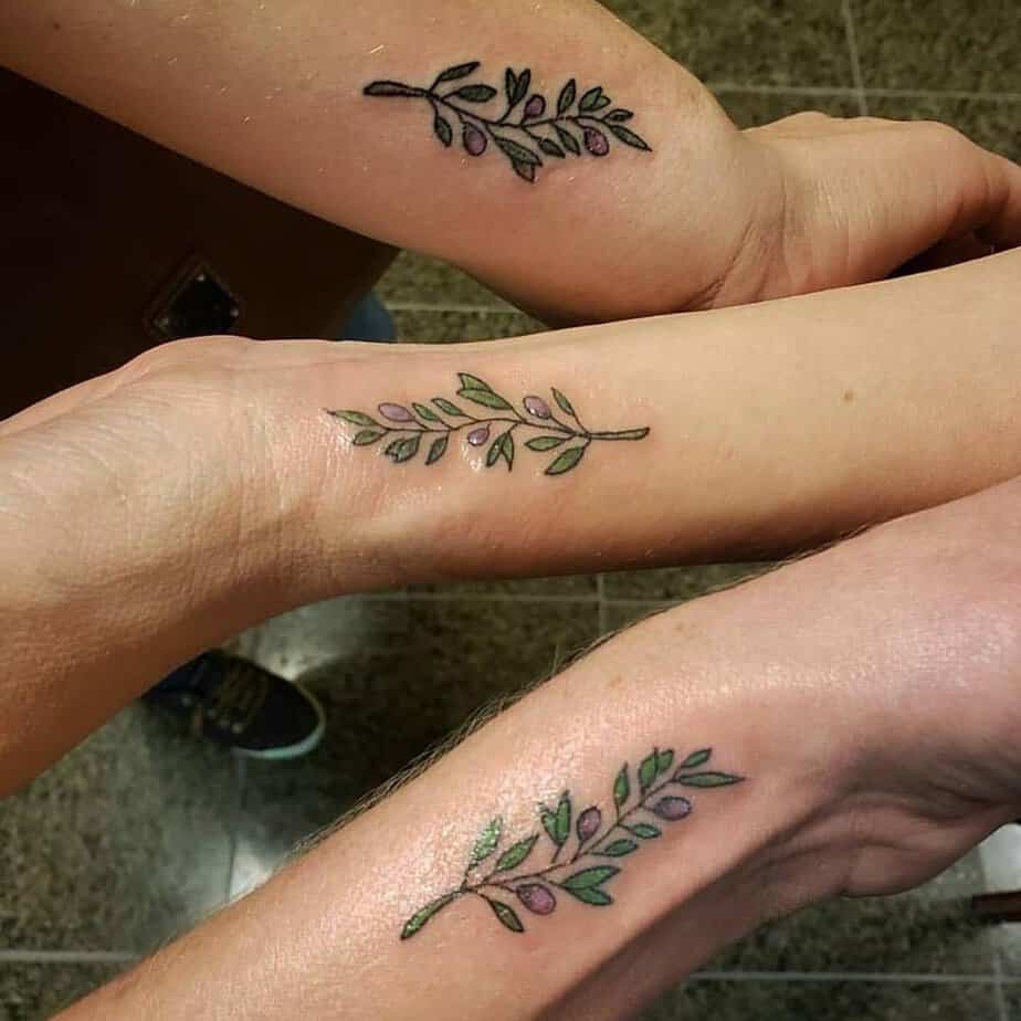 Matching olive tattoos