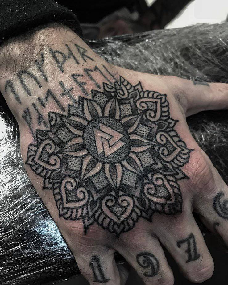 Powerful hand tattoo