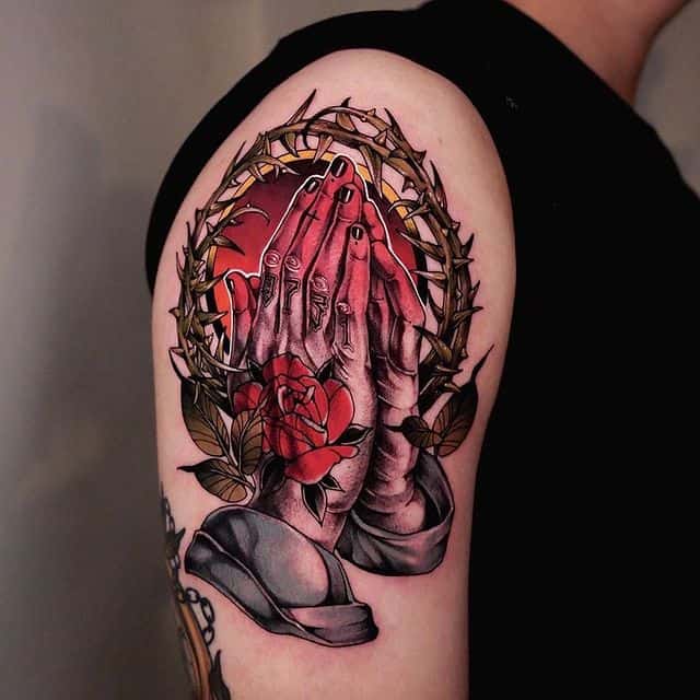 Praying hands tattoo in color
