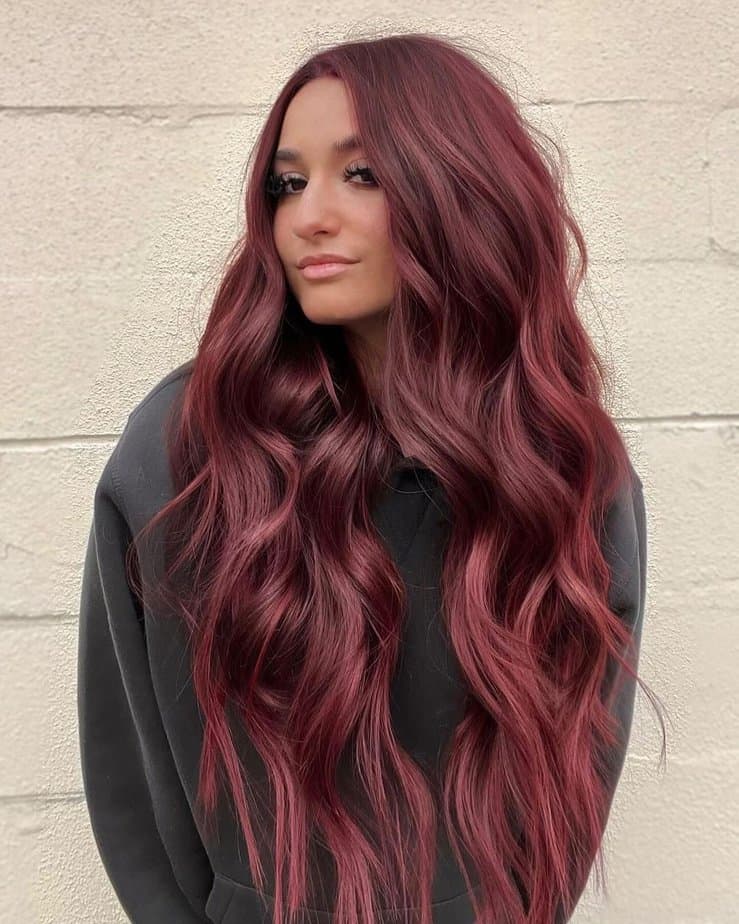 2. Maroon elegance with long flowing locks