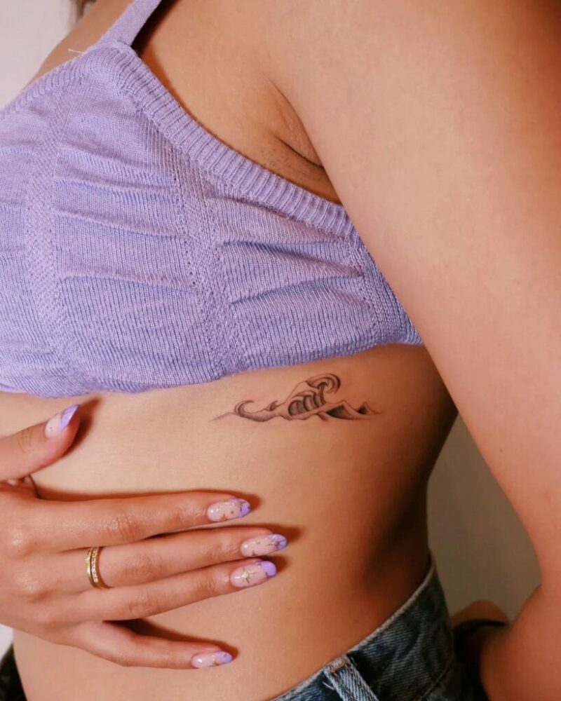 25 remarkable rib tattoos that8217ll totally be worth the pain