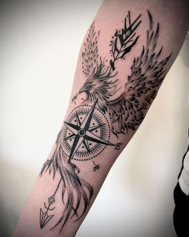 Compass arrow tattoo