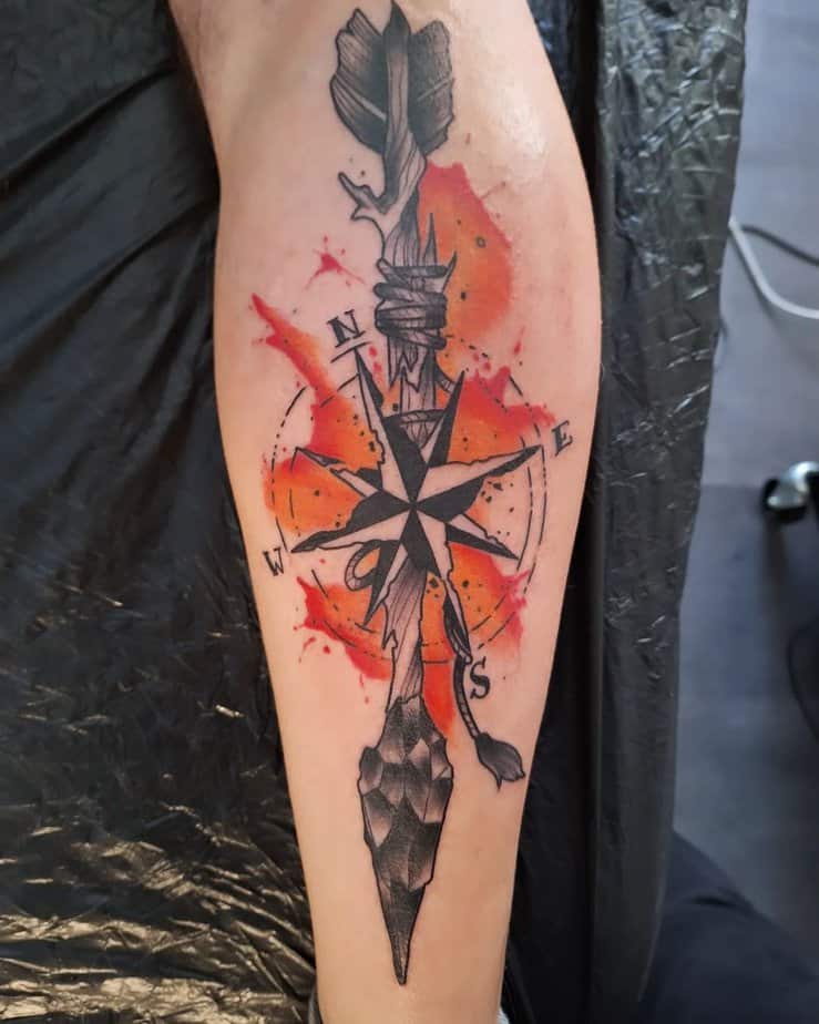 Fiery arrow tattoo