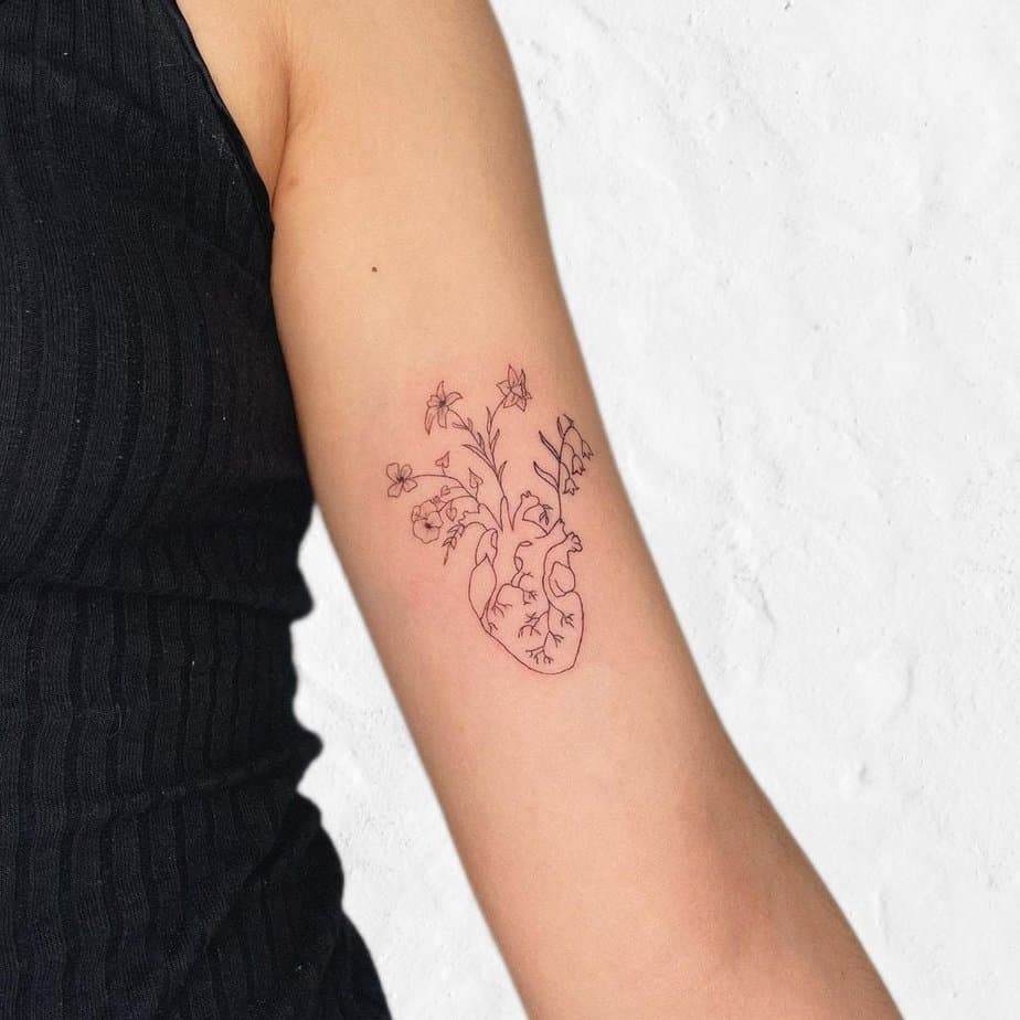 Floral heart outline tattoo