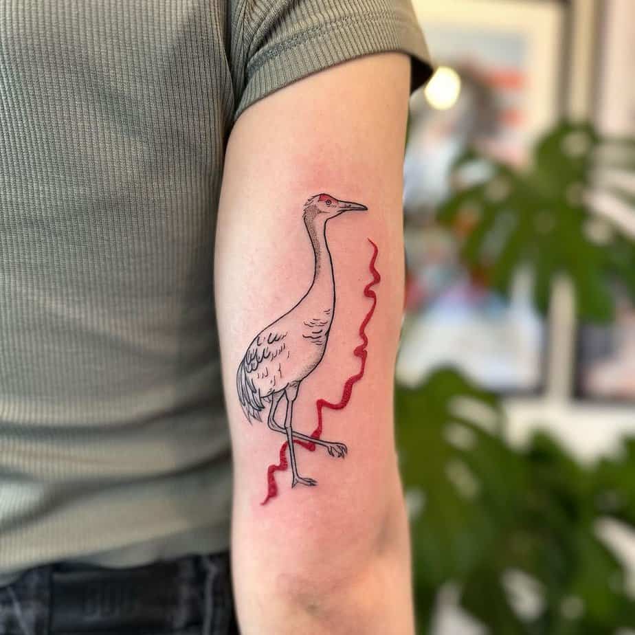 Fun crane tattoo