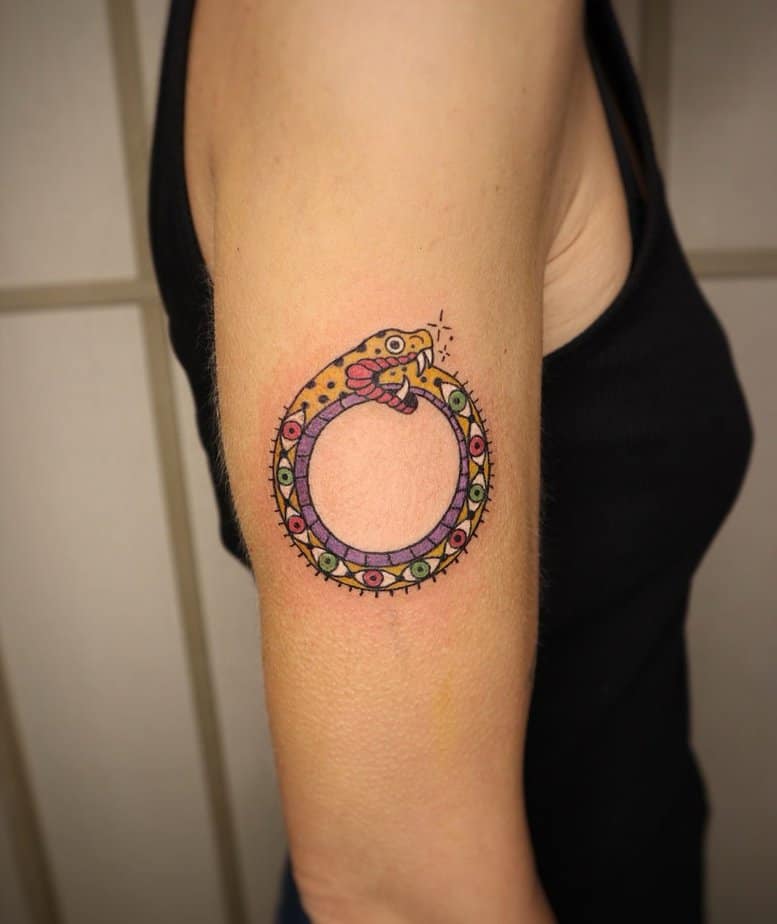 Fun ouroboros tattoo