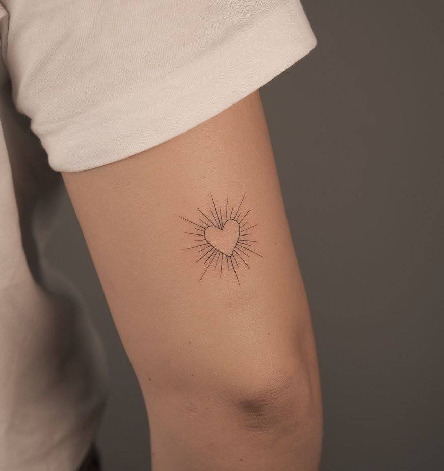 Glowing heart outline tattoo