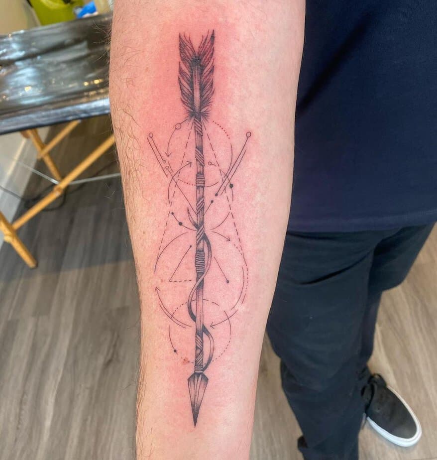 Intricate arrow tattoo