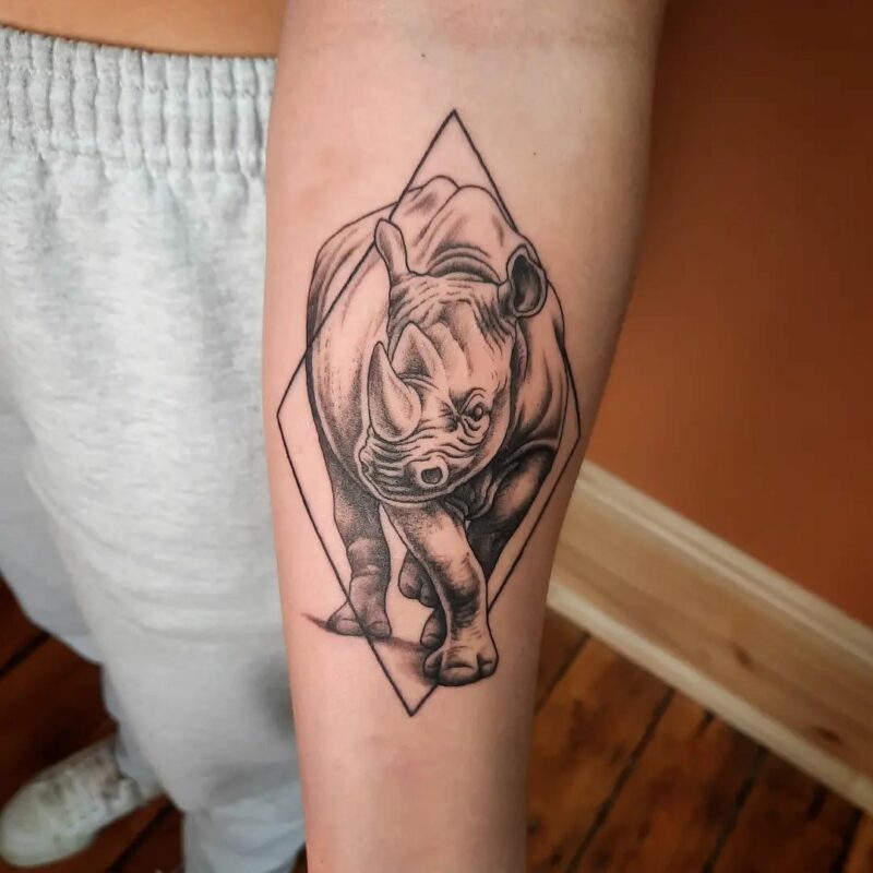 20 Interesting Rhinoceros Tattoos To Celebrate Your Strenght