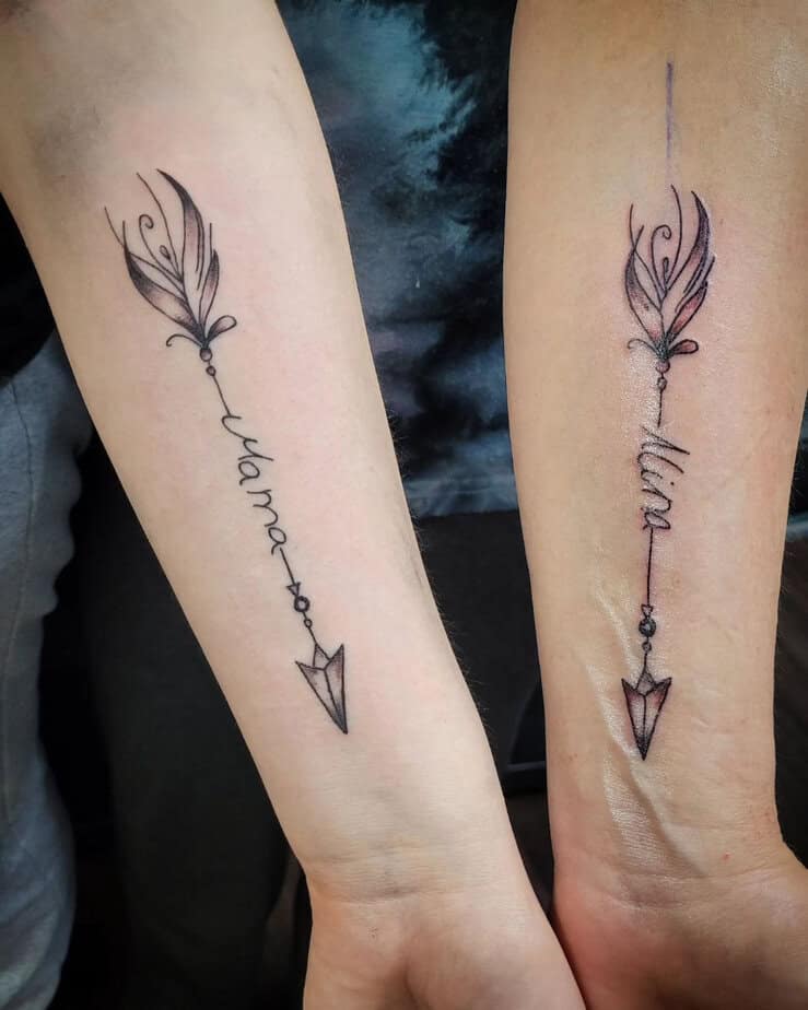 Matching arrow tattoos 1