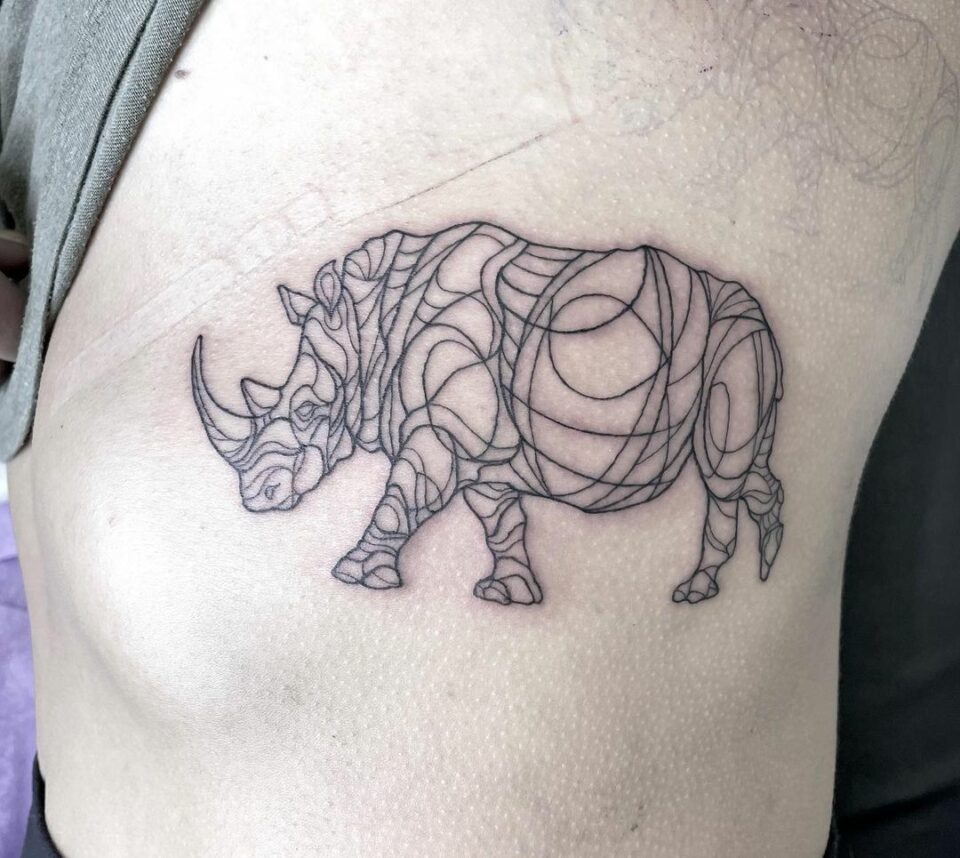 20 Interesting Rhinoceros Tattoos To Celebrate Your Strenght