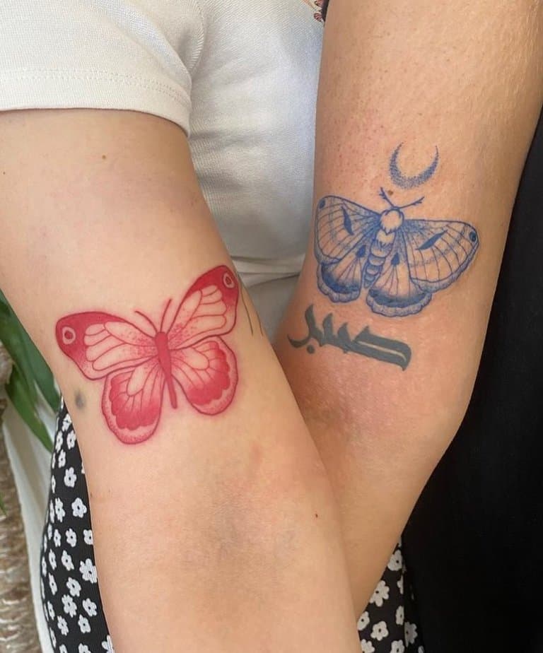 Red and blue butterfly tattoo