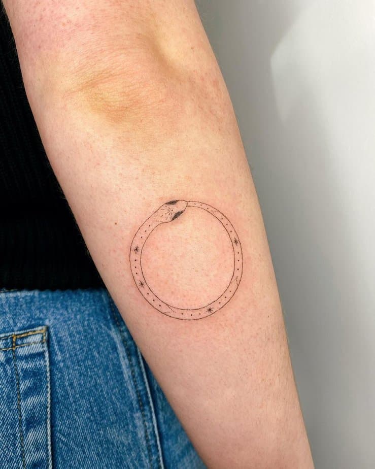 Simple ouroboros tattoo