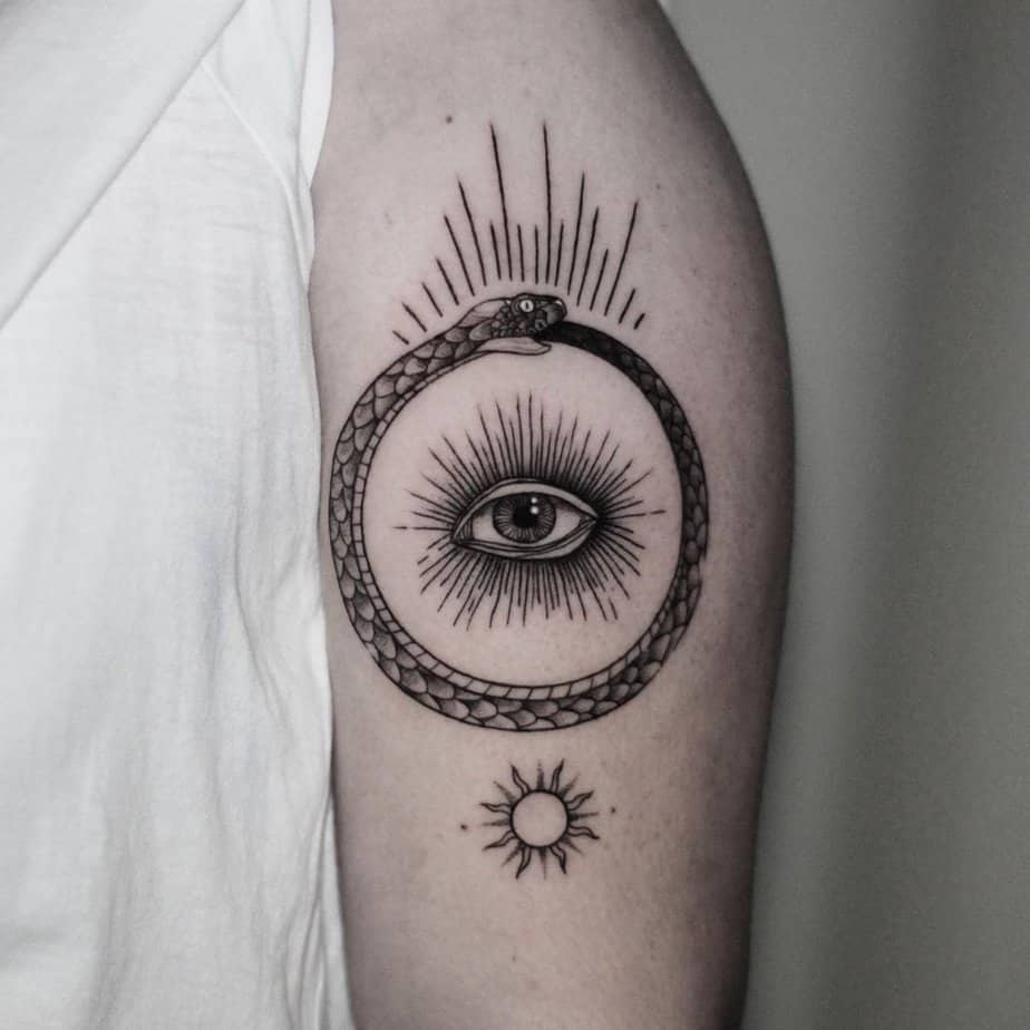 20 Powerful Ouroboros Tattoos To Honor The Cycle Of Life 