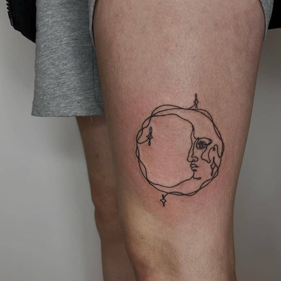 Whimsy crescent moon tattoo