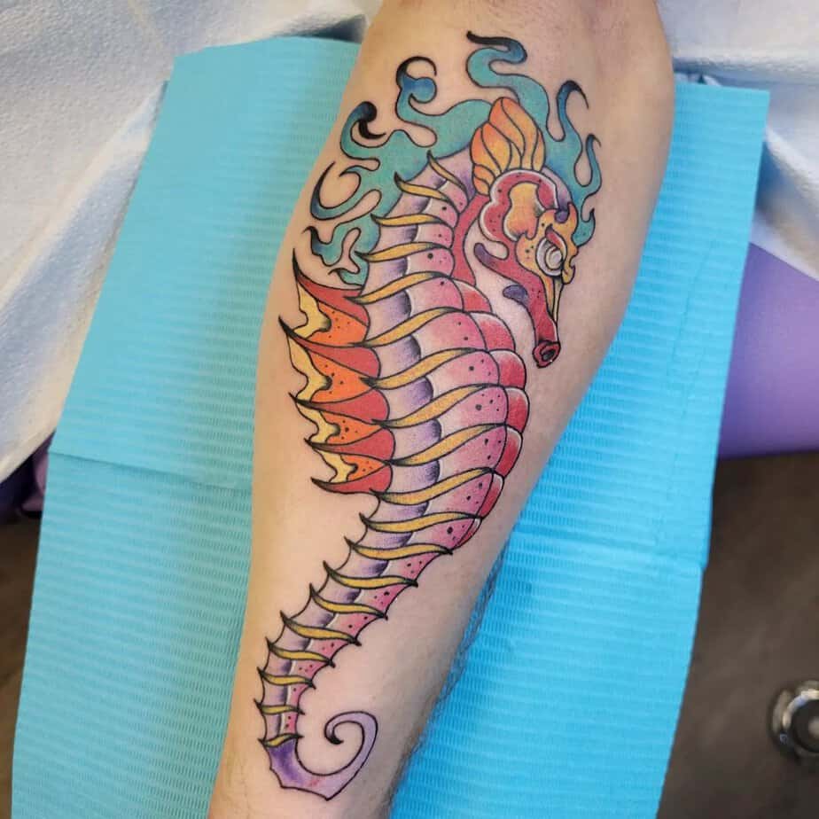 10. Vibrant colored seahorse tattoo