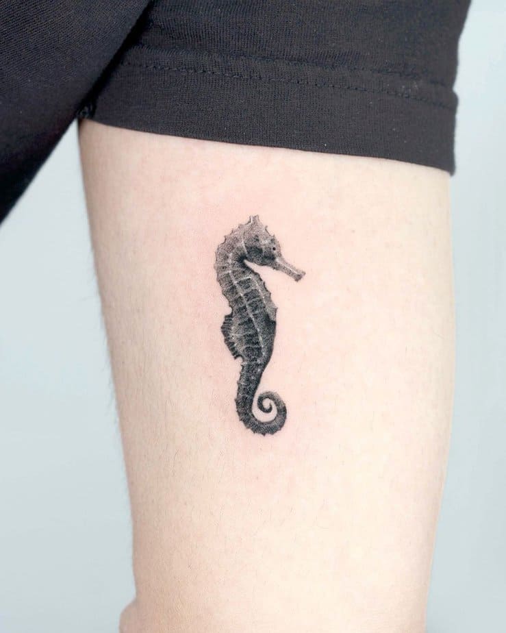 12. Tiny minimalistic seahorse tattoo