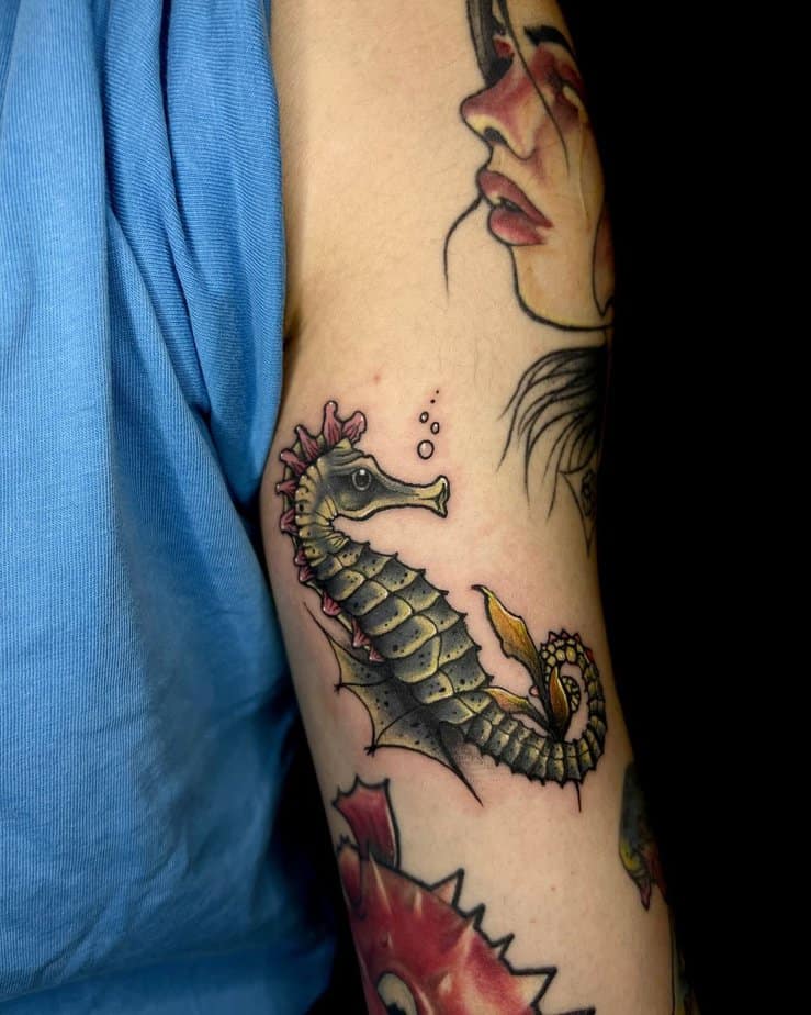 14. Neo traditional seahorse tattoo