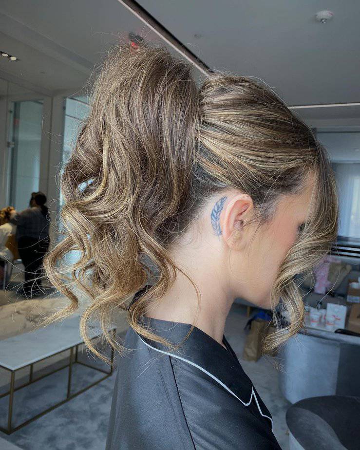 34. Classic Curled Ponytail