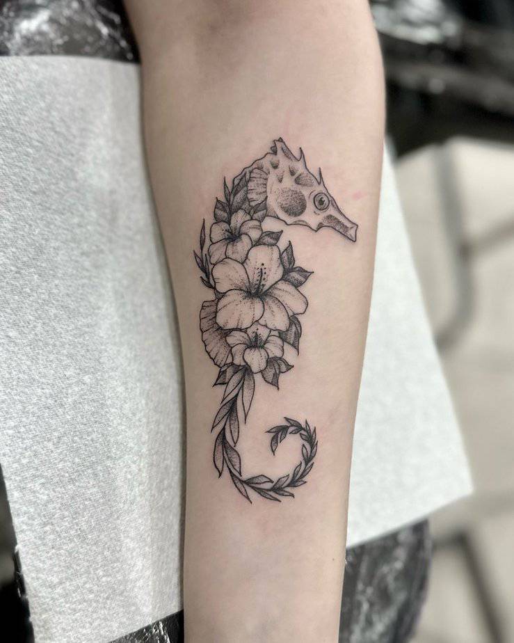 4. Floral seahorse tattoo