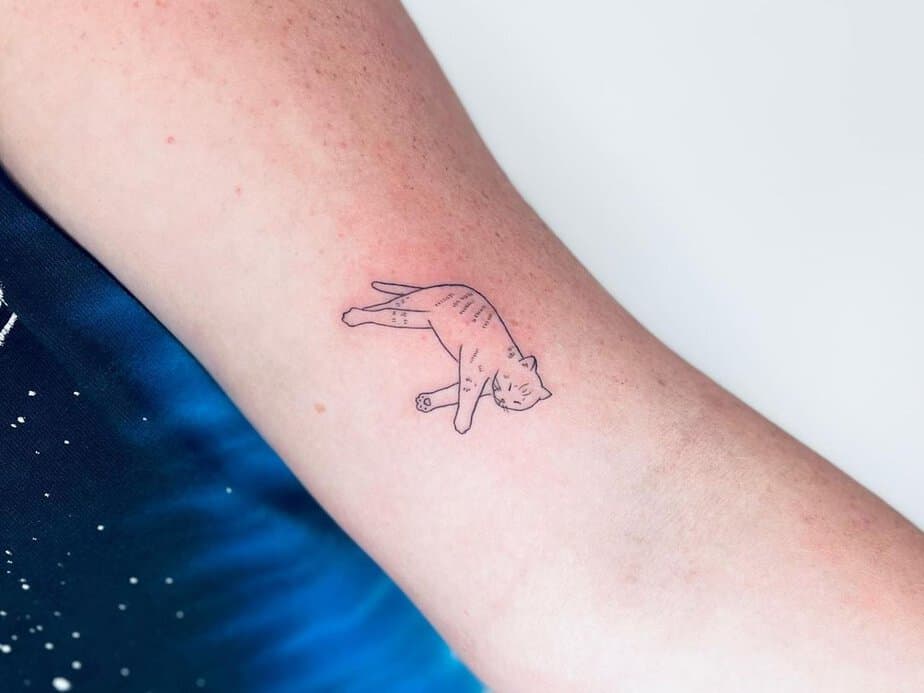 Cute cat outline tattoo