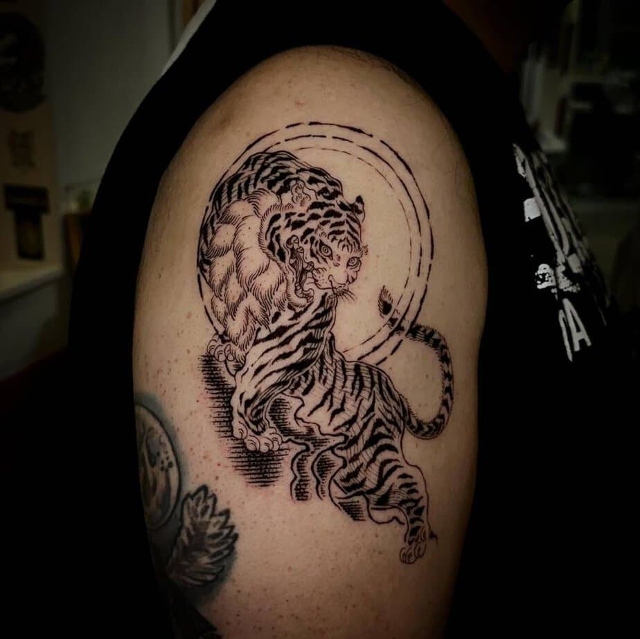 Engraving tiger tattoo