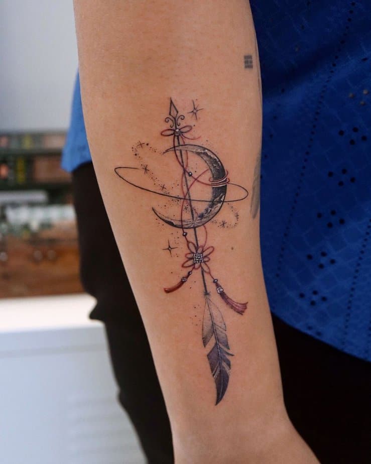 Feather arrow tattoo