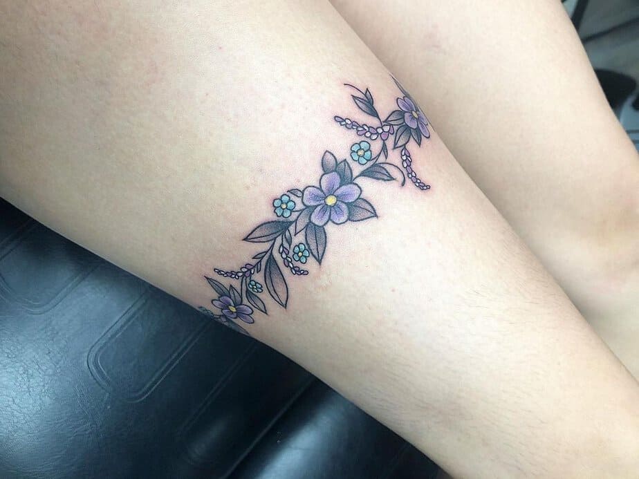 Floral garter tattoo in color