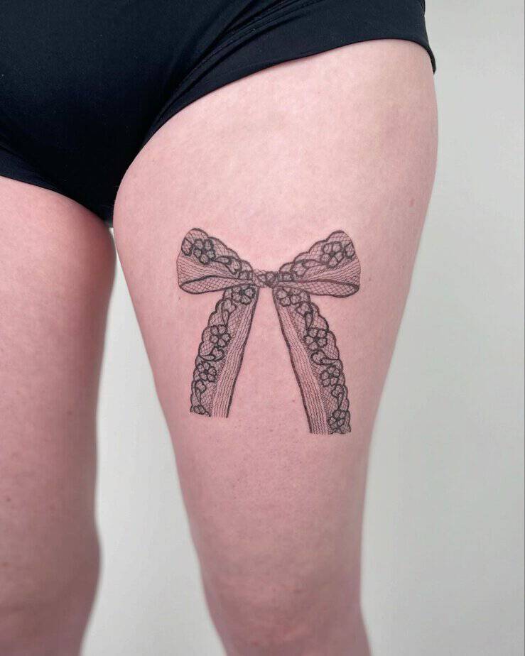 Lace bow tattoo