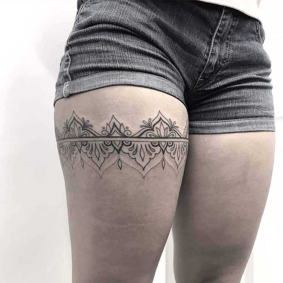 Ornamental garter tattoo