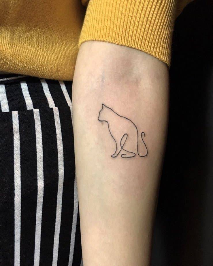 Simple cat outline tattoo