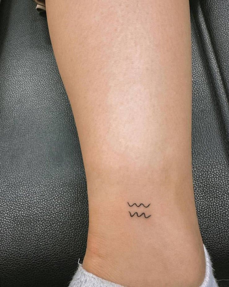 Shoot For The Stars With These 20 Amazing Aquarius Tattoo Ideas