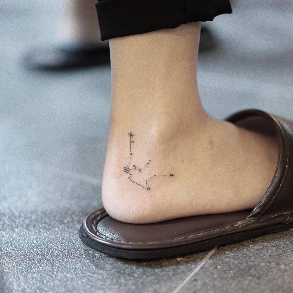 Shoot For The Stars With These 20 Amazing Aquarius Tattoo Ideas