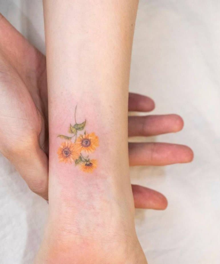 20 Adorable Flower Wrist Tattoo Ideas That Will Grow On You