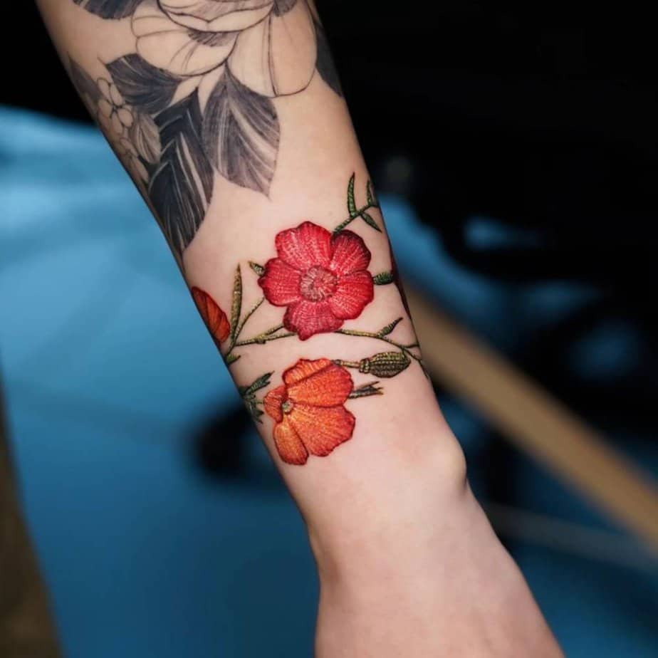 20 Adorable Flower Wrist Tattoo Ideas That Will Grow On You