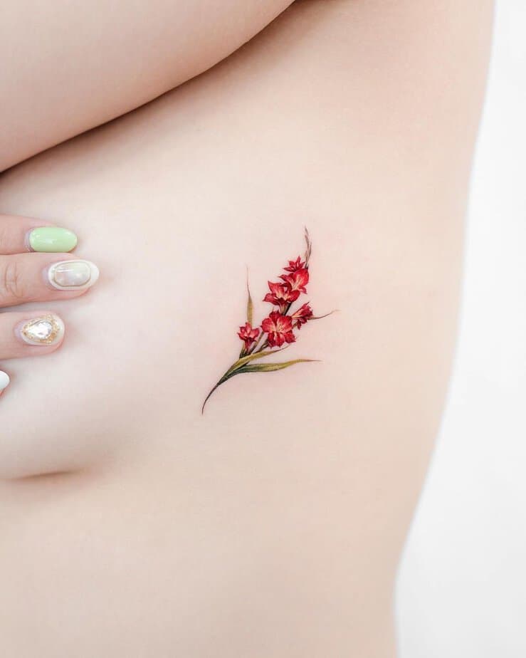 16. Tiny red gladiolus on the ribcage