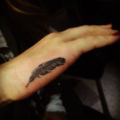 19. Mysterious feather tattoo